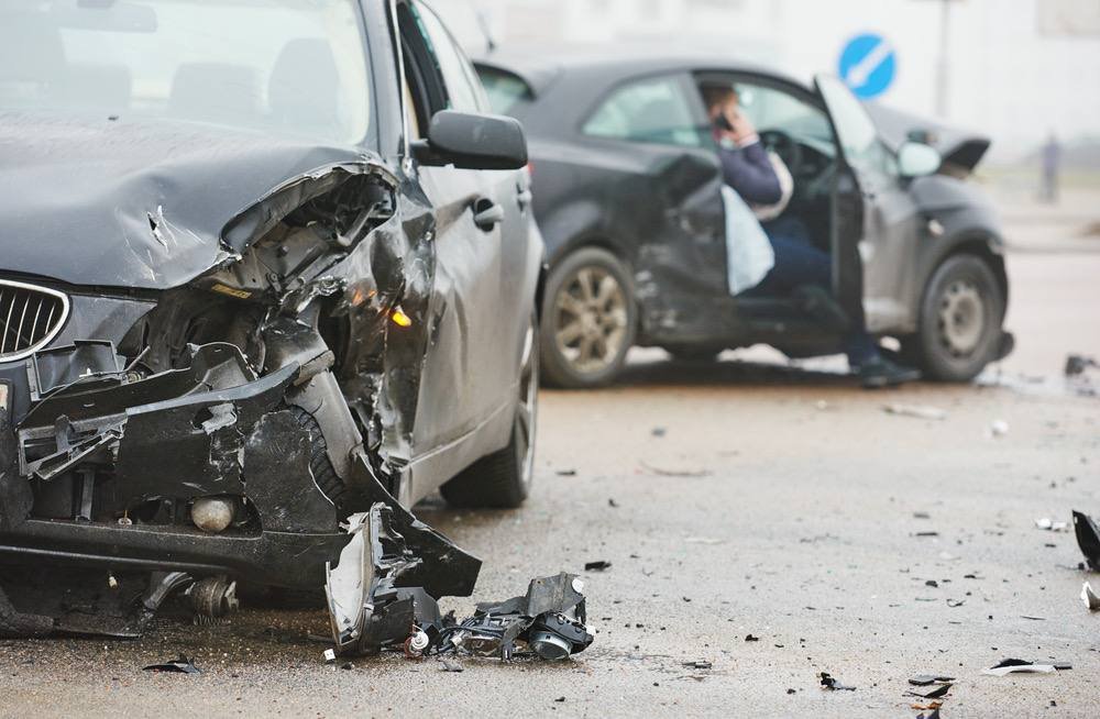 Car with front-end damage after a collision