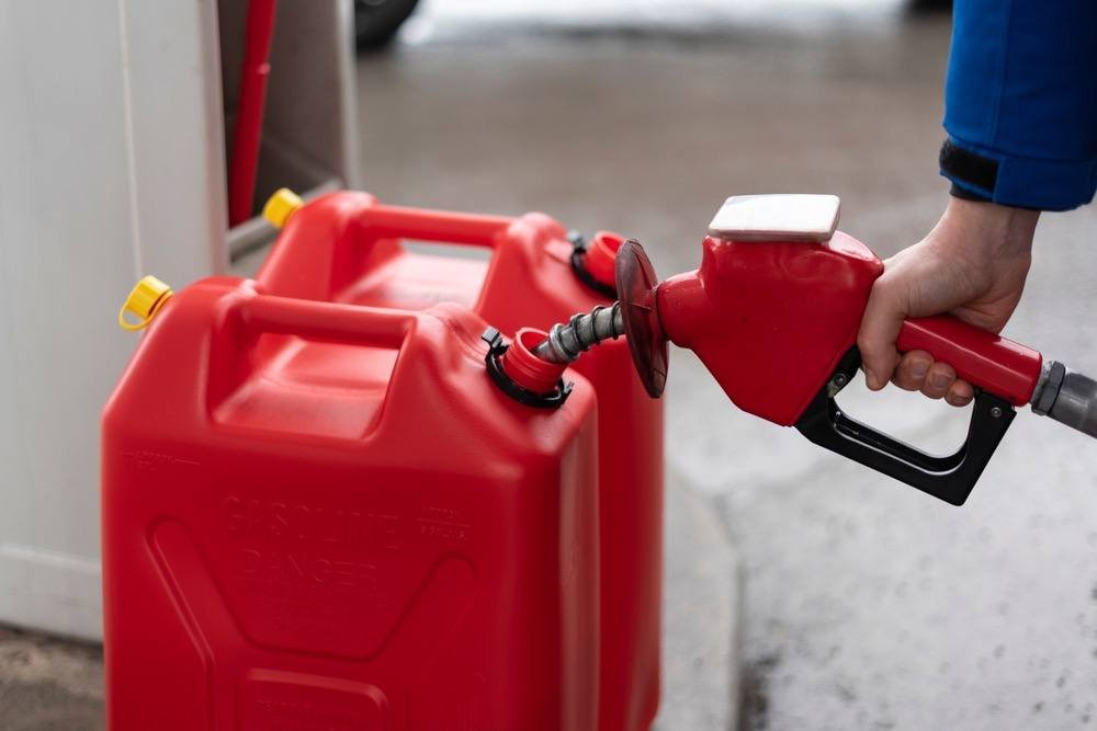 Red jerry cans of fuel