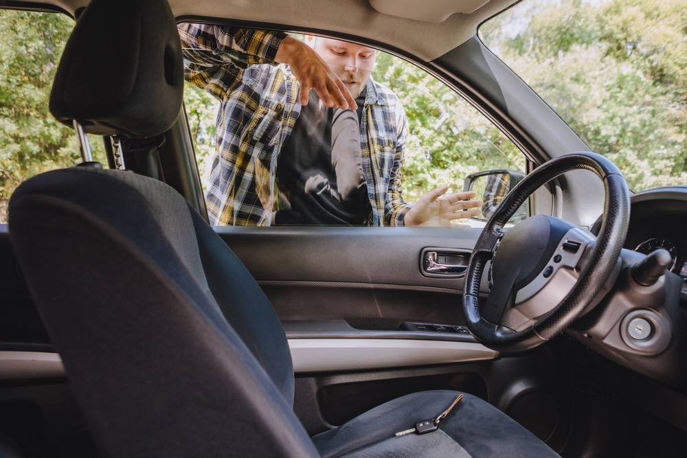 Technician unlocking a car door without damage